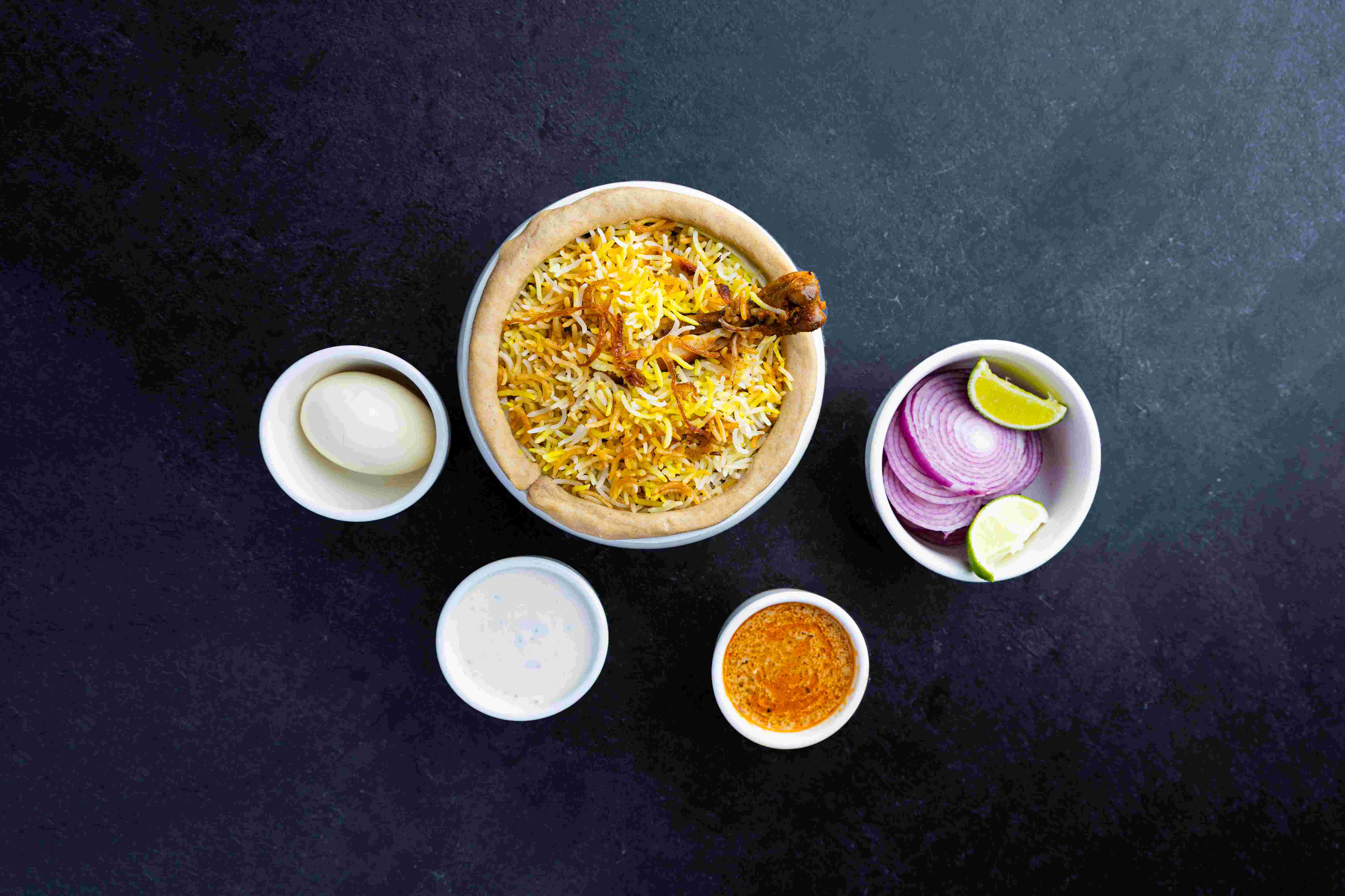 Best Chicken Dum Biryani in Frisco TX | Rotate Social